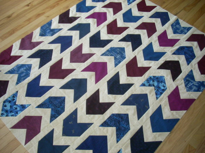 marine and burgundy arrow quilt top finish
