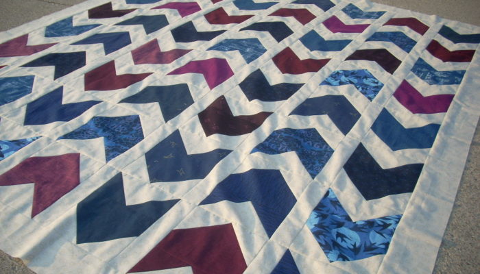 marine and burgundy arrow quilt top finish