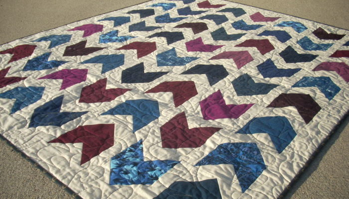 marine and burgundy arrow quilt