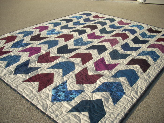 marine and burgundy arrow quilt