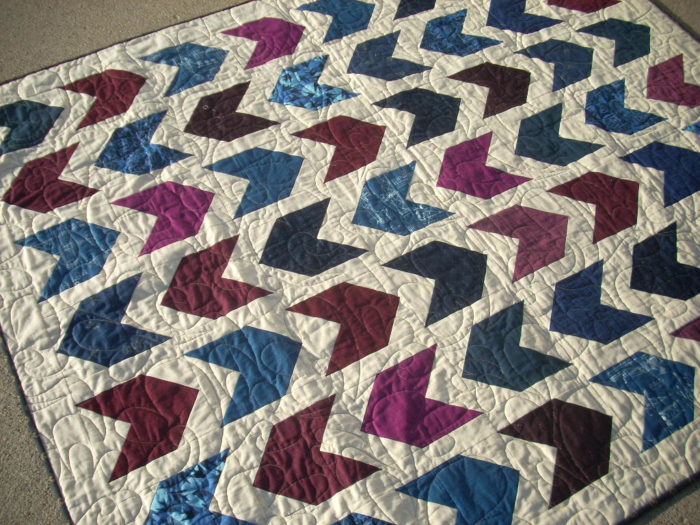 marine and burgundy arrow quilt