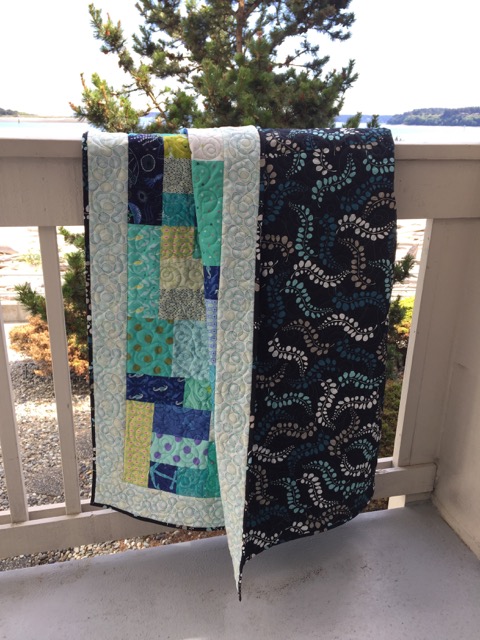 blue and green quilt